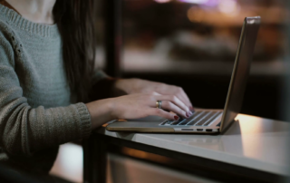 Person typing out an email on a zero trust policy